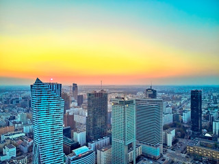 Obraz premium WARSAW, POLAND - APRIL 07, 2019: Beautiful panoramic aerial drone view to the center of Warsaw City and Palace of Culture and Science and 