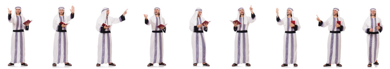 Arab man with koran isolated on white