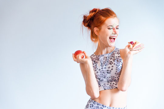 Happiness Of Cheat Meal Day For Fitness Young Woman Have Choosing To Eat Dessert And Say No Healthy Fruit On Her Diet Plan. Healthy Food Concept