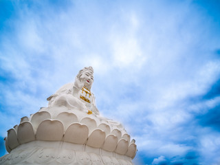 White Statue of Guanyin Sitting on The Lotus