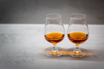 Glass of premium alcoholic drink (rum, cognac, whiskey)