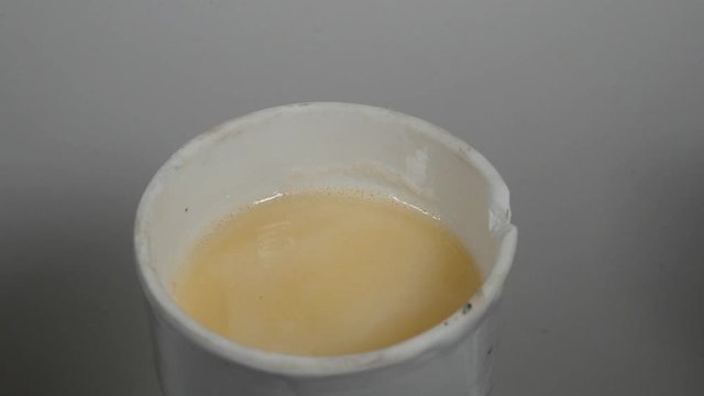 Demonstration of a Buchner funnel, first part is a look down on the filter, second part is a view of the whole vacuum filer flask system at work. 