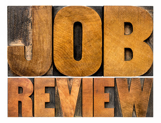 job review word abstract in wood type