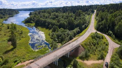 Fototapeta premium Top view of the surface of the forest lake Uzhin