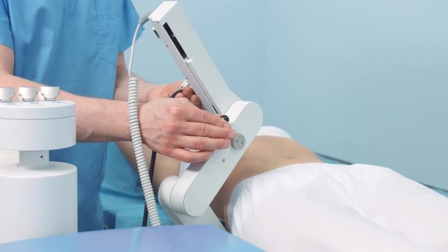 Positioning ultrasound transducer before kidney lithotripsy
