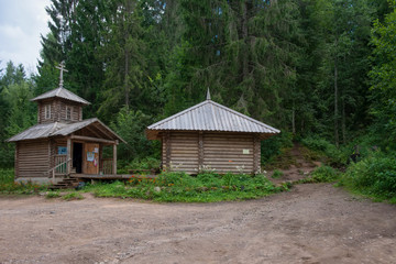 Fototapeta na wymiar Chapel and swimming pool in the forest near Tikunok spring