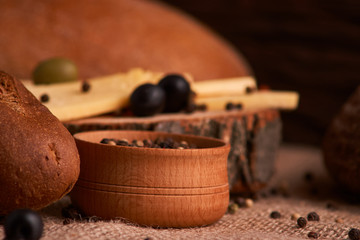 bowl of various pepper peppercorns seeds mix on table rastic style background