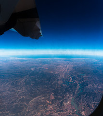 View of a window inside the plane during a flight