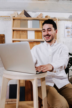 Environmental Portrait Of A Furniture Designer Maker In His Workshop