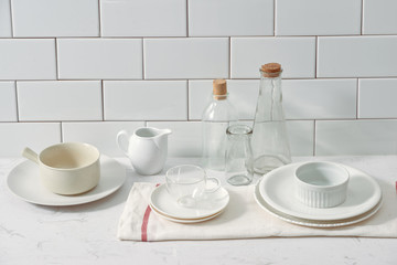 Fototapeta na wymiar Kitchen shelf full of various utensils isolated on white background