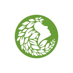 The girl's face in a beautiful pattern of leaves