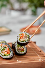 Korean roll Gimbap(kimbob) made from steamed white rice (bap) and various other ingredients