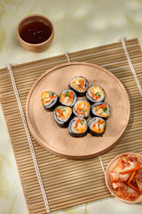 Korean roll Gimbap(kimbob) made from steamed white rice (bap) and various other ingredients