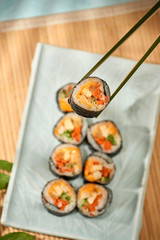 Korean roll Gimbap(kimbob) made from steamed white rice (bap) and various other ingredients