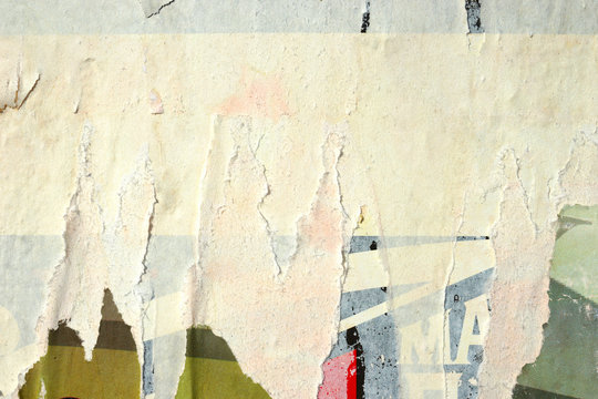 Old grunge ripped torn vintage collage street blank posters creased crumpled paper surface placard texture background backdrop empty space for text © Nikola