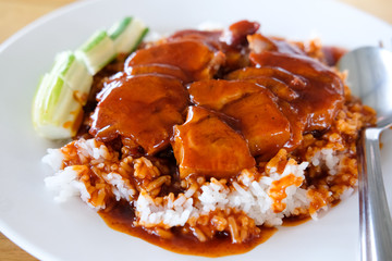 Red pork with rice and cucumber