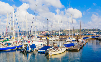 Fototapeta na wymiar Sailing boats at Doca De Belem marina in Lisbon, Portugal