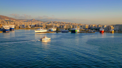 Port of Piraeus in Athens, Greece is the largest Greek seaport, logos blurred for commercial use