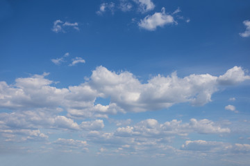 blue sky with cumulus clouds, natural background