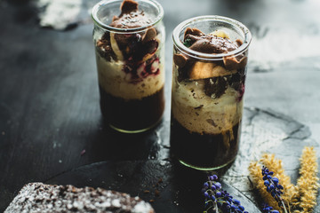 sweet, ice coffee with the addition of whipped cream, cranberry sauce and a ball of chocolate ice cream
