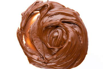 Chocolate cream isolated on white background. Flat lay.