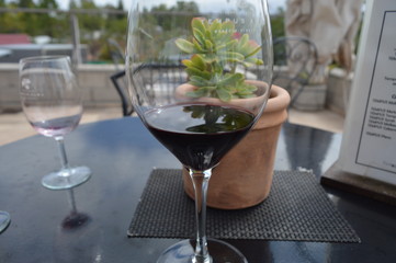 glass of white wine on table in restaurant