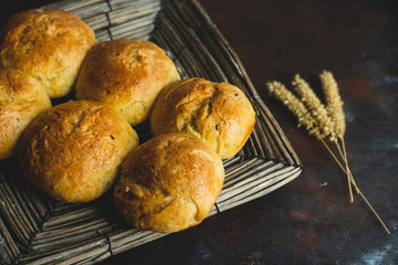 fresh buns, traditionally made at home on a wooden, rustic table