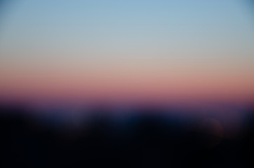 Incredible, beautiful, Bright sunset over the city. Gradient, the core of the sun. Beautiful sunset, red, orange