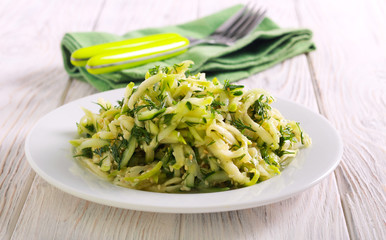 Cucumber and zucchini salad on plate