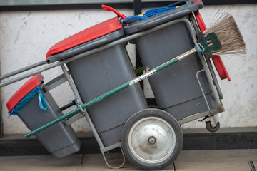 street cleaner barrow with brush and litter