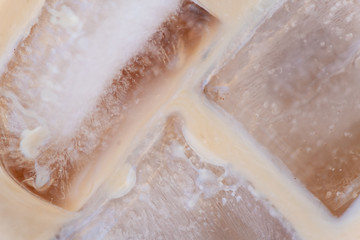 Obraz premium Abstract representation - ice cubes in alcoholic drink