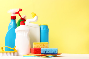  cleaning product on a colored background side view. Professional cleaning products, spring cleaning. Household chemicals