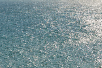 Texture of Black Sea. Blue frothy surface of sea water. Background shot of aqua sea aerial view. Marine concept.