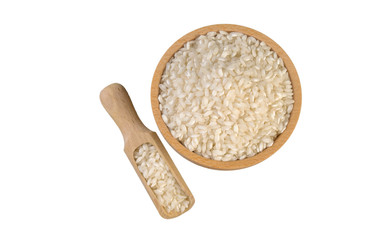 arborio risotto short grain rice in wooden bowl and scoop isolated on white background. nutrition. bio. natural food ingredient.