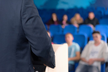 African american business coach gives presentation for businesspeople, multiracial and multiethnic business peoople at conference meeting room.