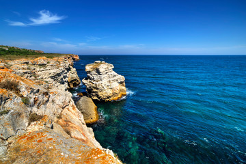 Stunningly beautiful landscape with rocky shore and blue sea