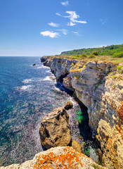 Stunningly beautiful landscape with rocky shore and blue sea
