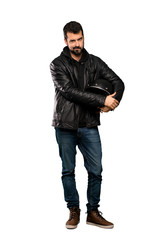 Naklejka premium Full-length shot of Biker man feeling upset over isolated white background