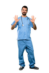 Full-length shot of Surgeon doctor man counting ten with fingers over isolated white background