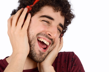 Young funny man with headphones