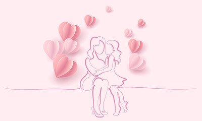 Woman hold her baby with air balloons