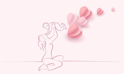 Woman hold her baby with air balloons