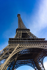 Low angle view close up Eiffel Tower in blue sky day