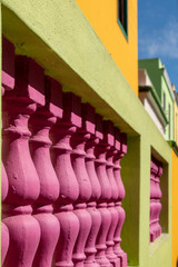 Obraz na płótnie Canvas Detailed photo of buildings in the Malay Quarter, Bo Kaap, Cape Town, South Africa. Historical area of brightly painted houses in the city centre occupied largely by the Moslem community.