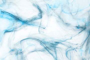 Obraz premium Isolated blue fog on the white background, smoky effect for photos and artworks. 