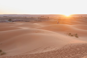 Fototapeta na wymiar Morocco, Merzouga, Erg Chebbi Dunes at Sunrise