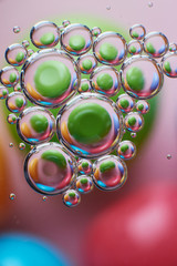 colored oil drops on water