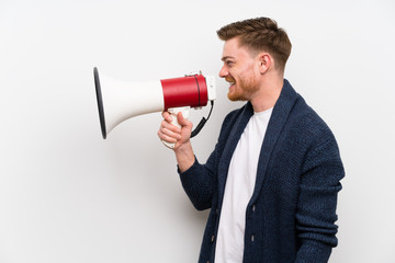 Redhead man holding a megaphone