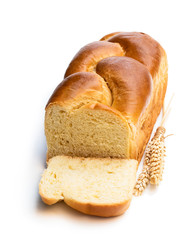 Homemade brioche loaf isolated on white
