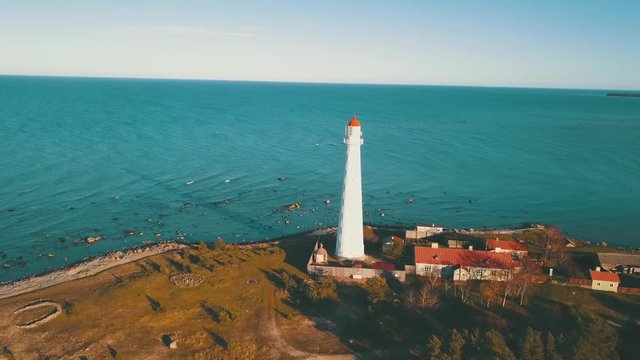Lighthouse on small island in Baltic sea filmed by drone